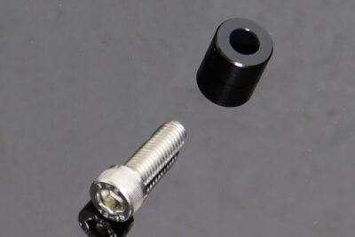 Spacer, Ignition Switch Holder, MC18, MC22